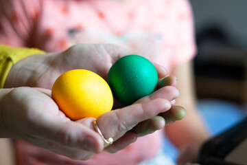 easter eggs in hand