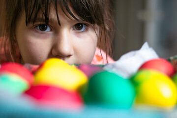 little child with eggs