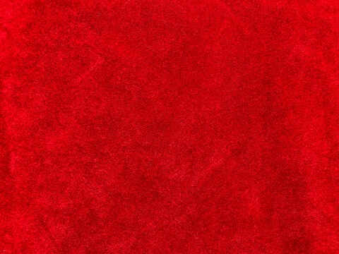 Dark red velvet fabric texture used as background. Empty dark red fabric background of soft and smooth textile material. There is space for text..	