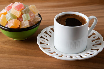 Traditional Turkish delight and Turkish coffee on a wooden background,top view	