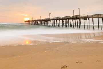 Beautiful sunrise at Nags Head Pier, Outer Banks, North Carolina, USA. 