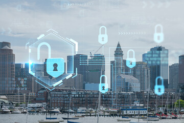 Panorama city view of Boston Harbor at day time, Massachusetts. Building exteriors of financial downtown. Glowing Padlock hologram. Concept of cyber security to protect confidential information