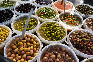 Pickled olives of different varieties at the bazaar.