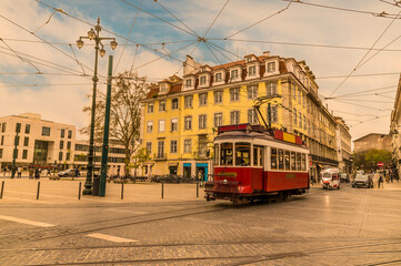 Fototapeta na wymiar A view of transport in a square in the Bairro Alto distict in the city of Lisbon on a spring day