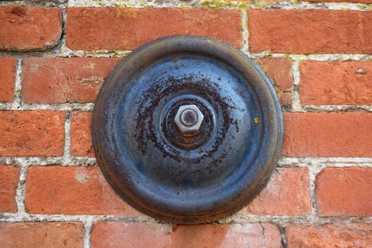 old brick wall with tie bar