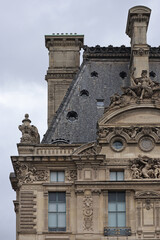 Detail of the facade of the Louvre in Paris