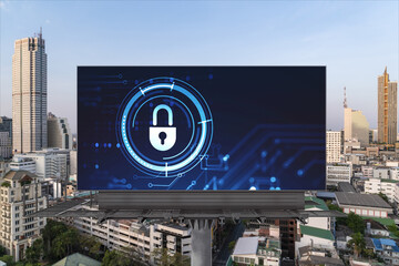 Padlock icon hologram on road billboard over panorama city view of Bangkok at day time to protect...