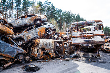 Fototapeta premium IRPIN, Kyiv REGION, UKRAINE 24.04.2022. Car graveyard. Shot cars of civilians. russia's war against Ukraine