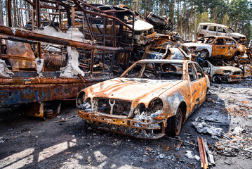 IRPIN, Kyiv REGION, UKRAINE 24.04.2022. Car graveyard. Shot cars of civilians. russia's war against Ukraine