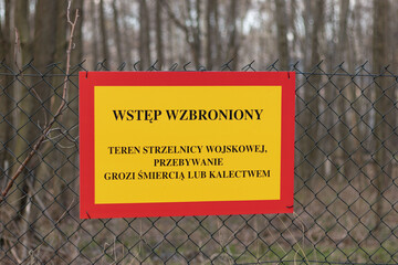 A sign informing about the military area. Inscription in Polish. 