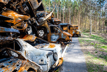 Fototapeta premium IRPIN, Kyiv REGION, UKRAINE 24.04.2022. Car graveyard. Shot cars of civilians. russia's war against Ukraine