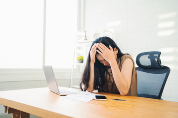 Business woman sad depressed unhappy need to payment bill in debt online using credit card debit...