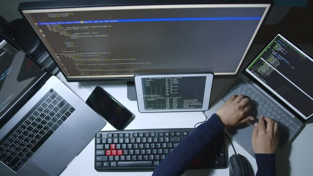 Timelapse developer programmer, software engineer, IT support working on computer laptop, typing keyboard, to check coding in bugging system. Top view