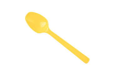 Yellow spoon isolated on a white background
