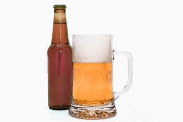 Close up of a tempting beer mug with a bottle