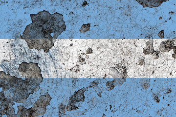 Argentina flag on a damaged old concrete wall surface