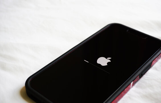 Screen of Upgrading software loading with Apple Icon on Iphone. Ho Chi Minh City, Vietnam - April 23, 2022