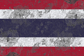 Thailand flag on a damaged old concrete wall surface