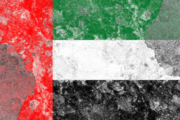United arab emirates flag on a damaged old concrete wall surface