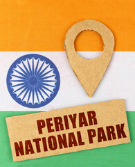 On the Indian flag, a geolocation symbol and a sign with the inscription - Periyar National Park