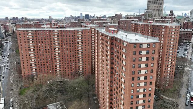 aerial rising above housing projects in Harlem NYC