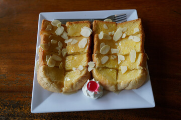 top view Toast with milk and butter on the table