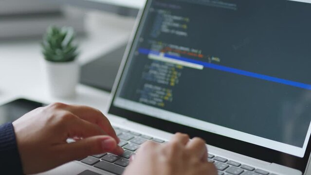 Closeup hand of developer programmer, soffware engineer, IT support, typing on computer keyboard