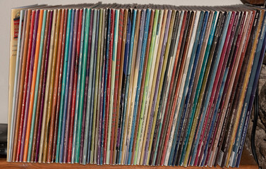 Bigbury, Devon, England, UK. 2022. Large collection of play along music books in an alcove.