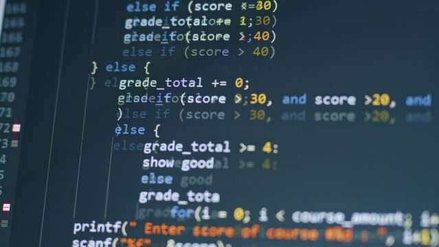 Close up of programming code running on computer screen