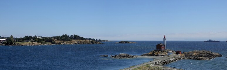 Panorama view of Fisgard Lighthouse at shores of Victoria Island BC Canada 
