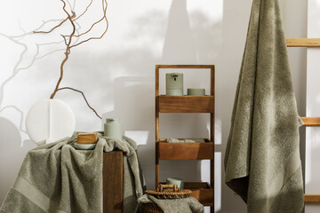 Modern aesthetic bathroom accessories in eucalyptus green shade. Organic cotton bath towels, sensor...