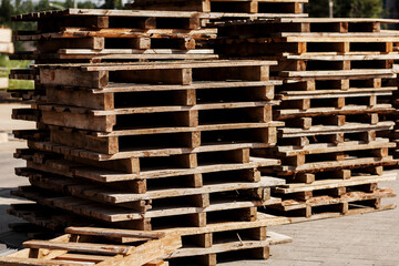 stack of pallets sit outside