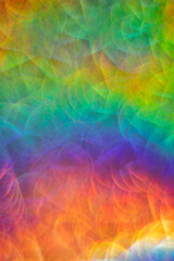 bright abstract iridescent background with bokeh holography