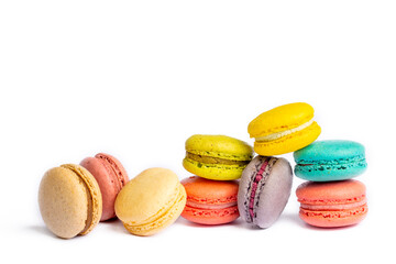 Colorful macaroon cakes. Small french muffins. Colorful macarons on a white background