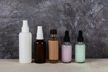 Jars with cosmetic lotions and oils. Skin care.