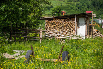 wooden shed for storing firewood in Ukrainian village