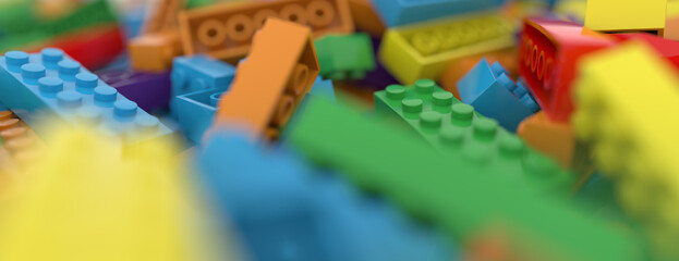 Colored toy bricks background. Rainbow colors. Random coloured plastic construction blocks. 3d illustration