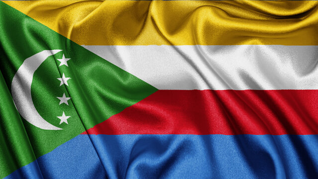 Close up realistic texture fabric textile silk satin flag of Comoros waving fluttering background. National symbol of the country. 6th of July, Happy Day concept