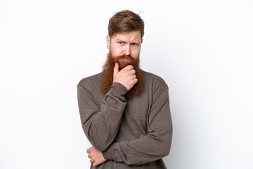Redhead man with beard isolated on white background thinking