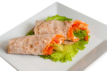 Pita bread wrapped with vegetables and sour cream on a plate iso