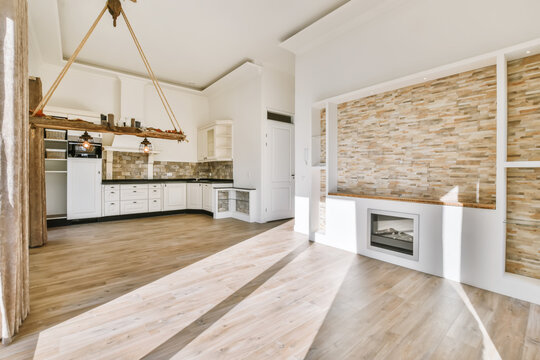 Kitchen with white furniture in apartment