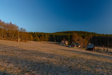 Spring sunny frosty morning in Paseky nad Jizerou village