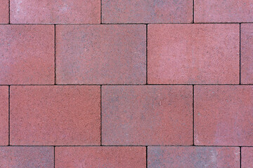 Red stone wall with rectangular blocks. Can be used as background, floor or wall.