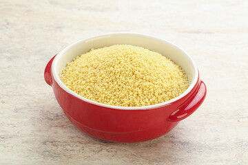Raw couscous in the bowl