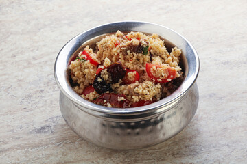 Arabic cous cous with meat and tomato