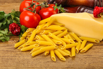 Raw penne rigate for cooking