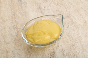 Organic mustard sauce in the bowl