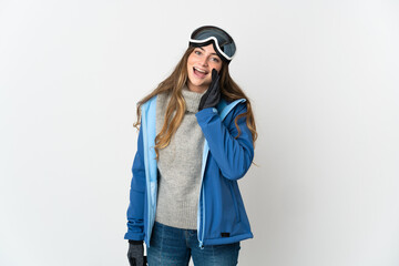 Skier girl with snowboarding glasses isolated on white background shouting with mouth wide open