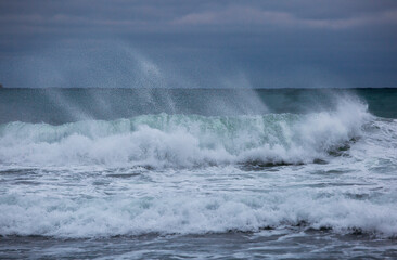 waves crashing on rocks