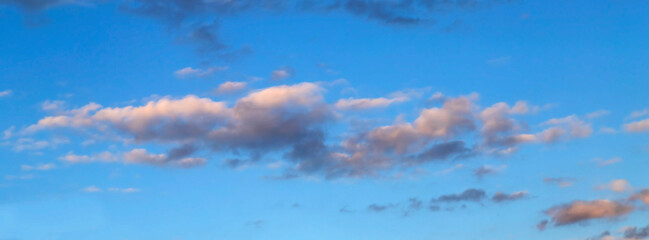 Lonely cloud in a clear blue sky.
